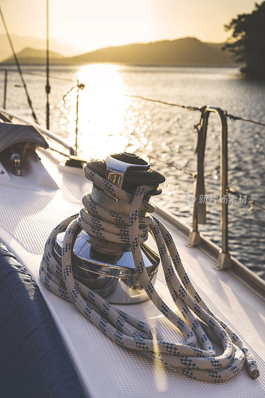 Yacht sailing at dawn